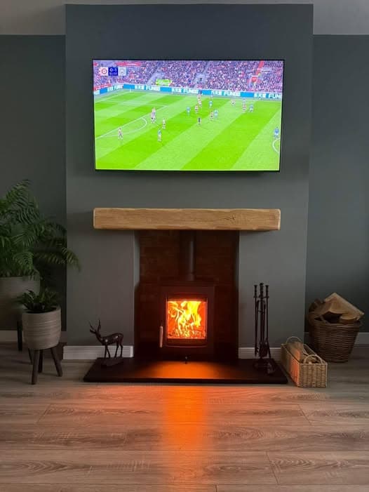 False Chimney Breast with Inset TV and Wood Burning Stove