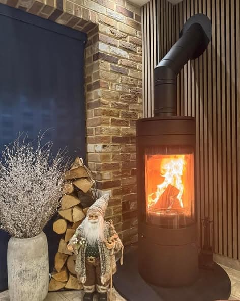 Two Wood Burning Stove Installations in a Stunning Home
