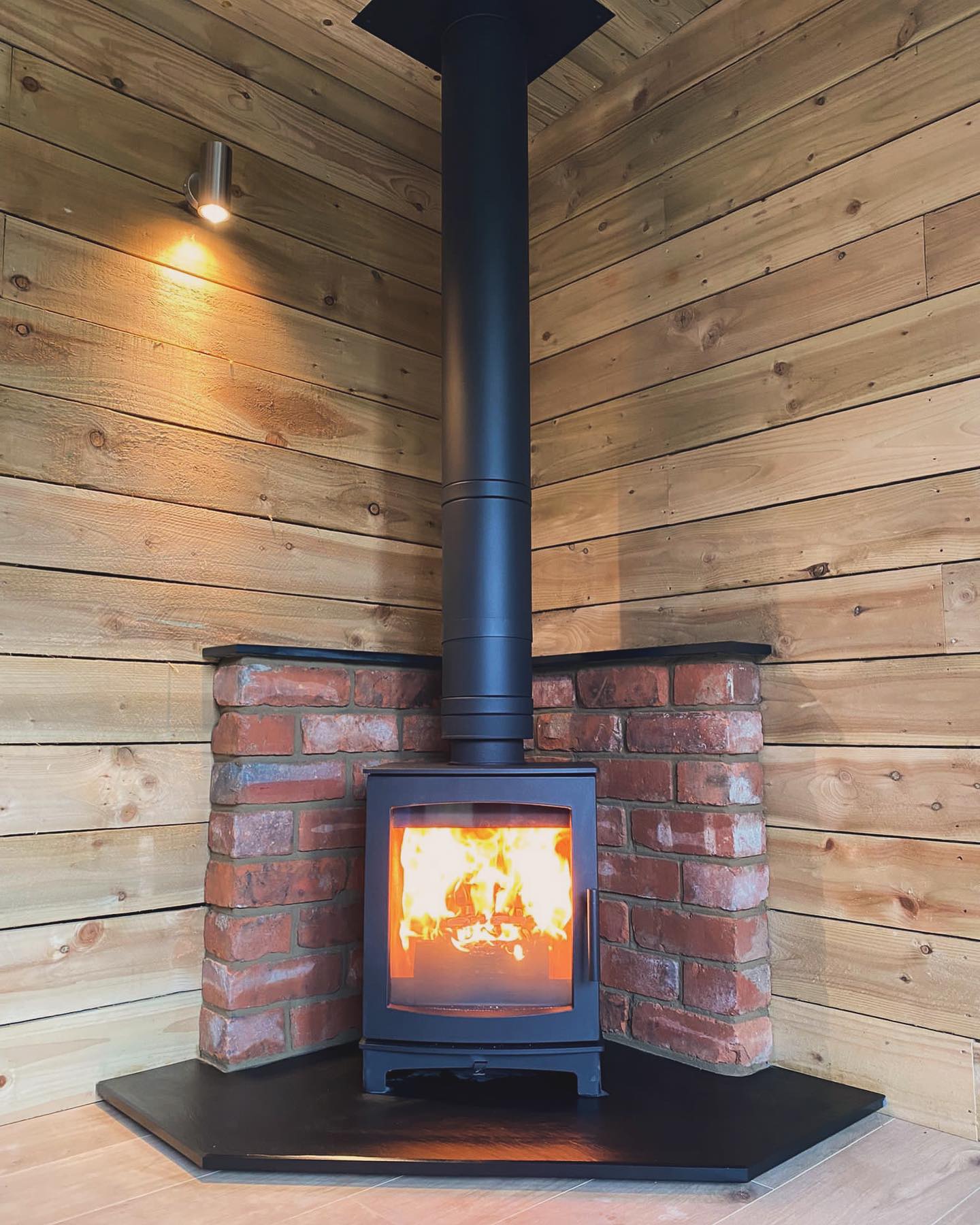 Wood Burning Stove Installation in Timber Garden Room