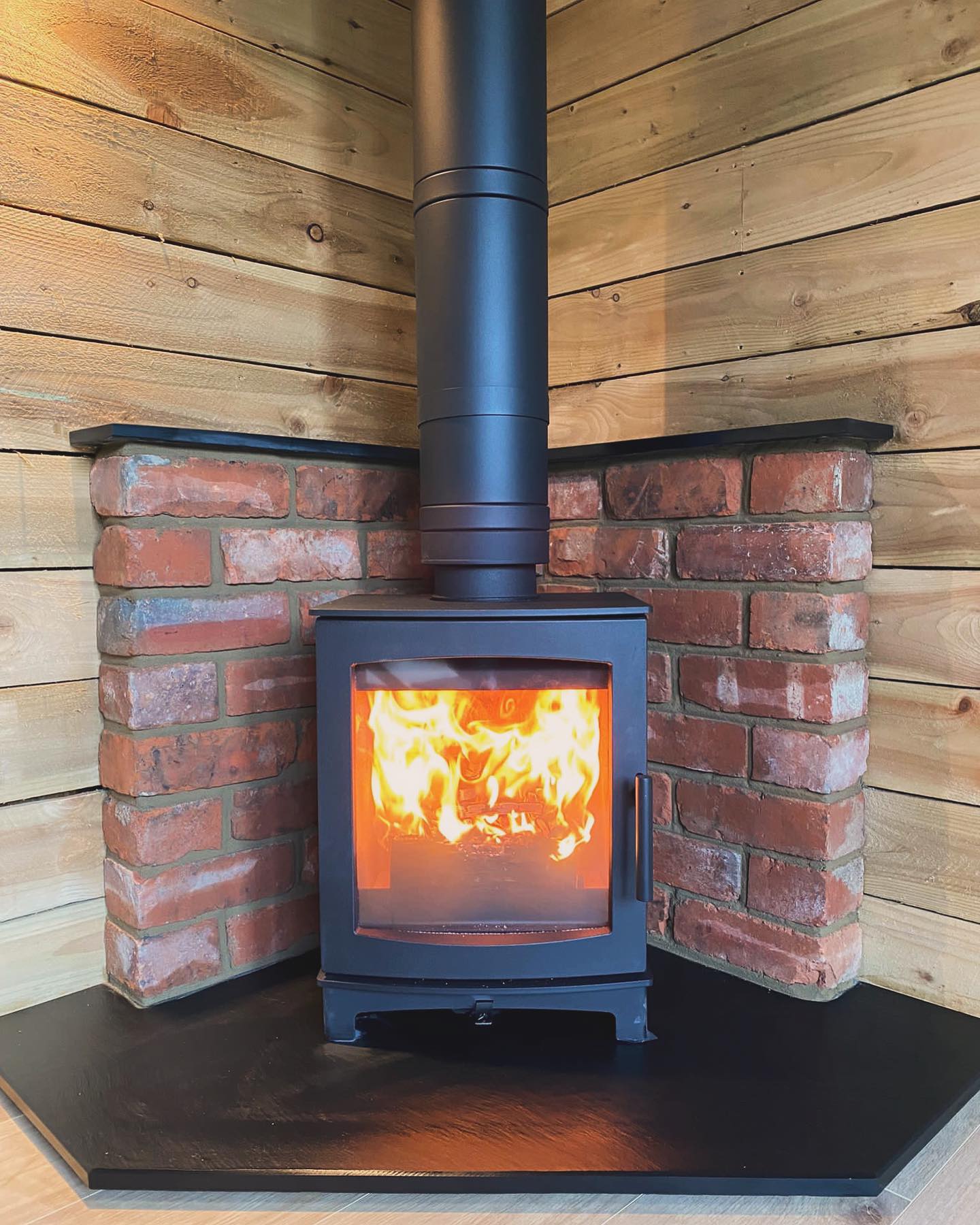 Wood Burning Stove Installation in Timber Garden Room