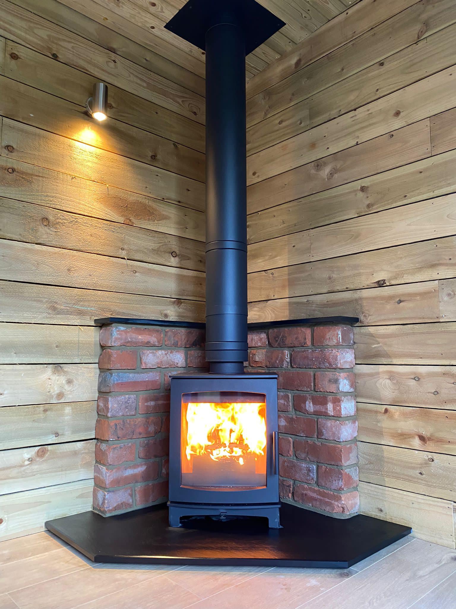Wood Burning Stove Installation in Timber Garden Room