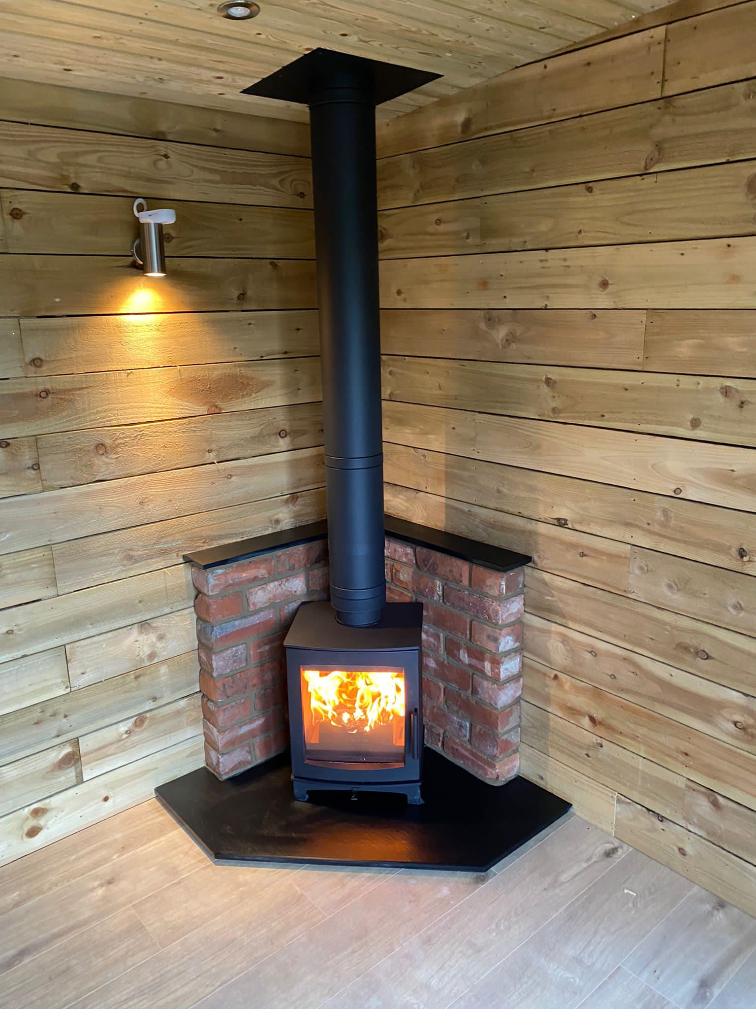 Wood Burning Stove Installation in Timber Garden Room