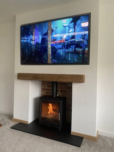 Feature Chimney Breast with Wood Burning Stove and Inset TV