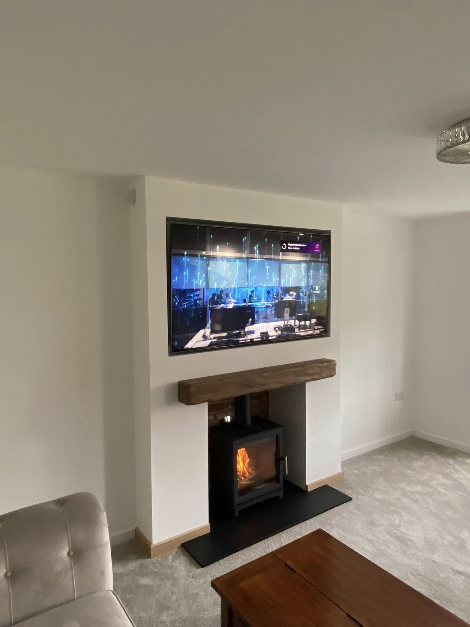 Feature Chimney Breast with Wood Burning Stove and Inset TV