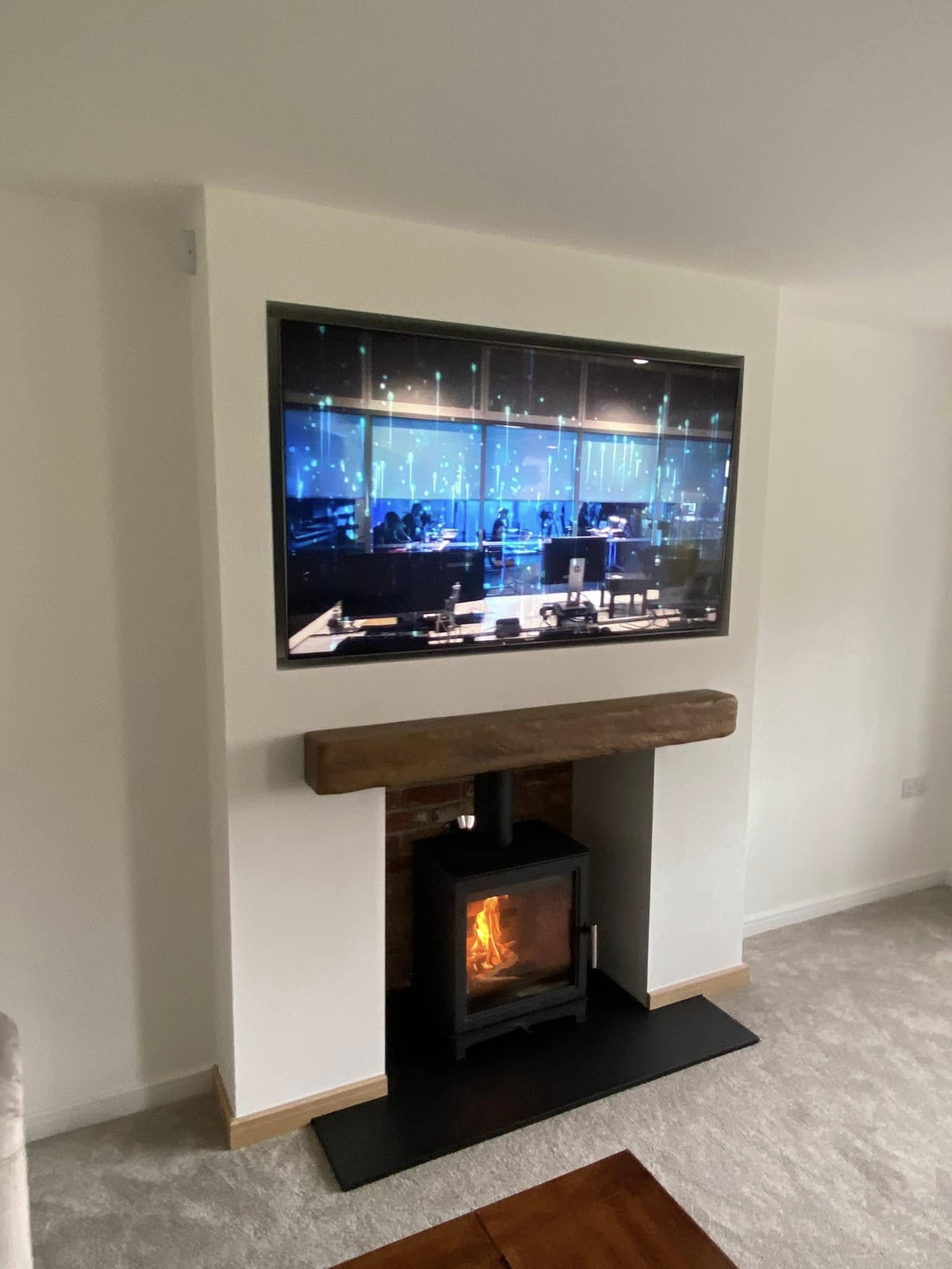 Feature Chimney Breast with Wood Burning Stove and Inset TV