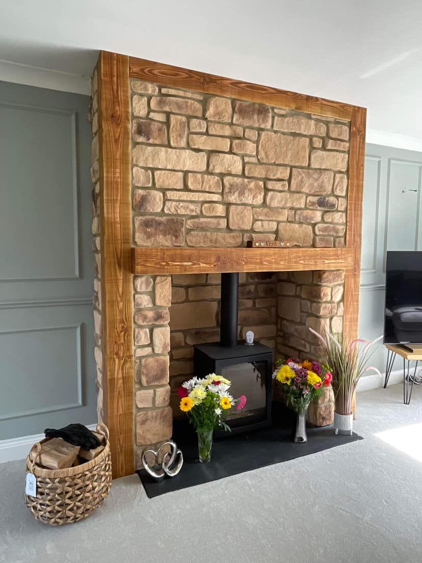 Stone-Clad Chimney Breast with Wood Burning Stove