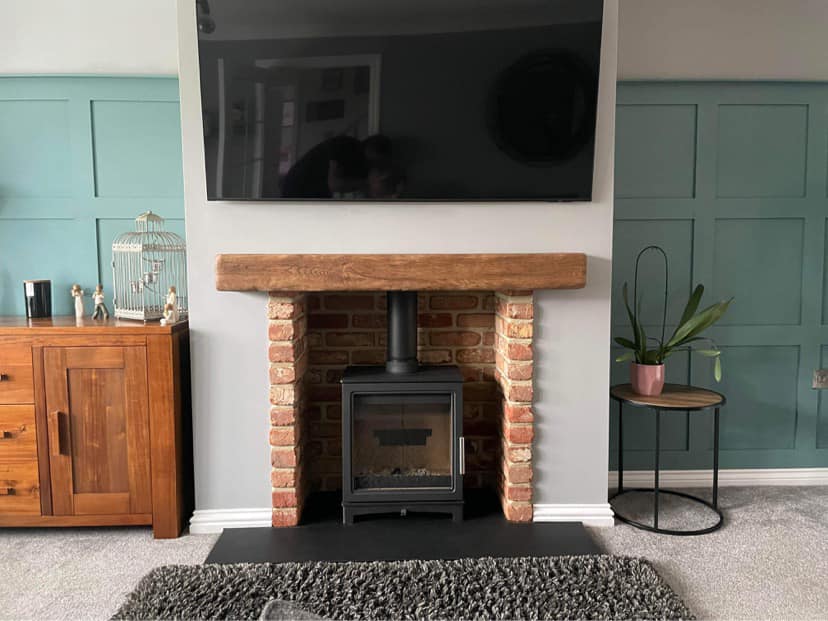 Murton Living Room Transformation with Stove and Brick Chamber