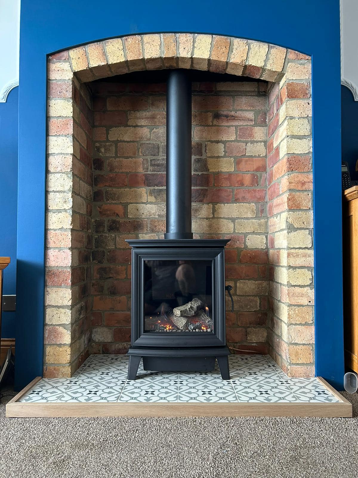 Newbiggin Fireplace with Tiled Hearth and Original Brickwork