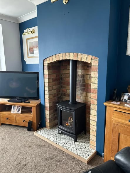 Newbiggin Fireplace with Tiled Hearth and Original Brickwork