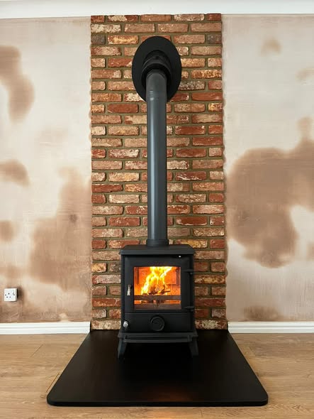 Fireplace Refresh with Shaped Slate Hearth and Brick Slip Back Panel