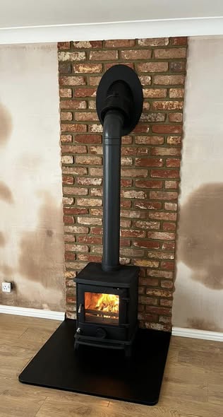 Fireplace Refresh with Shaped Slate Hearth and Brick Slip Back Panel