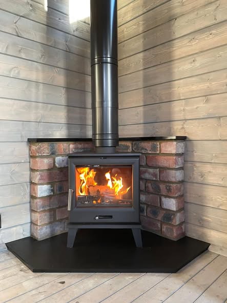 Nevis Edge Multifuel Stove in Amble Garden Room