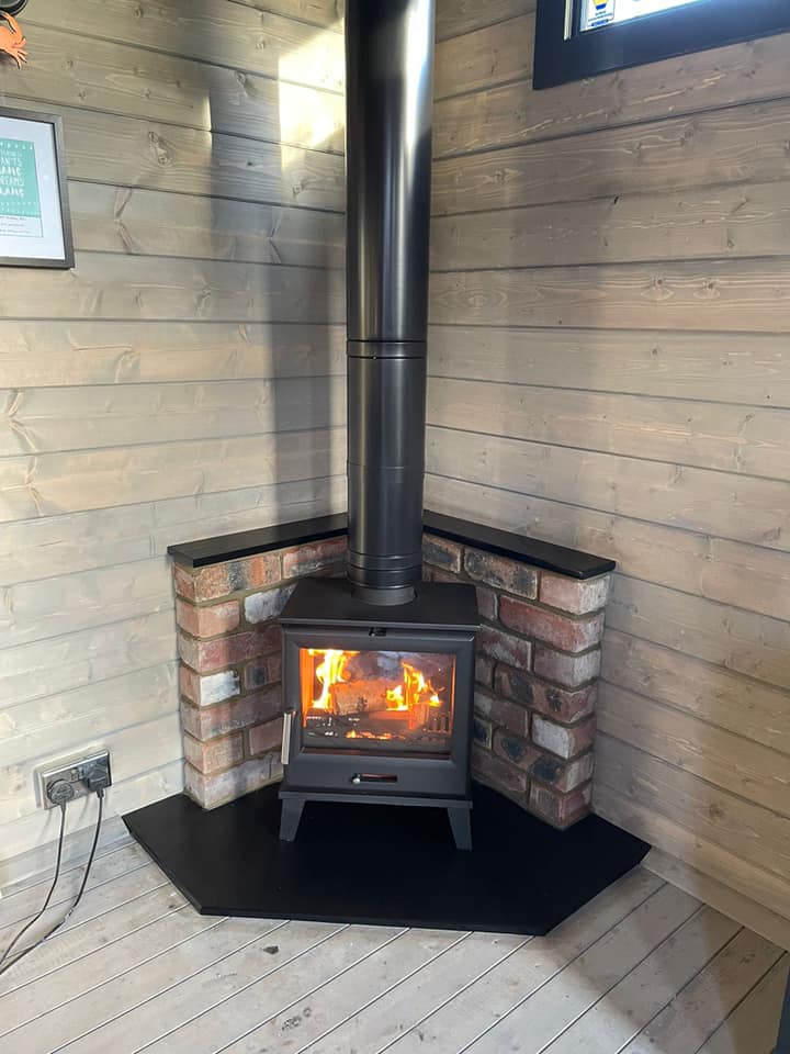 Nevis Edge Multifuel Stove in Amble Garden Room
