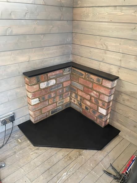 Nevis Edge Multifuel Stove in Amble Garden Room