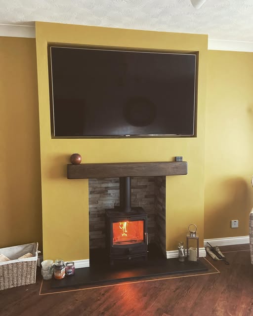 Flat External Wall Transformed with Stove and Inset TV