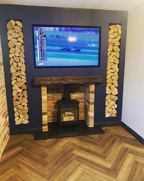 First-Floor Stove Media Wall with Built-In Log Storage