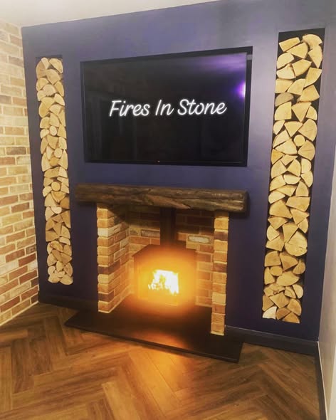 First-Floor Stove Media Wall with Built-In Log Storage