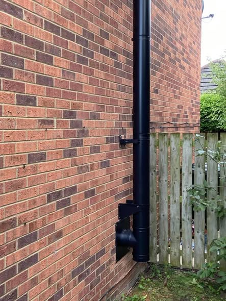 Feature Chimney Breast with Inset TV and External Flue