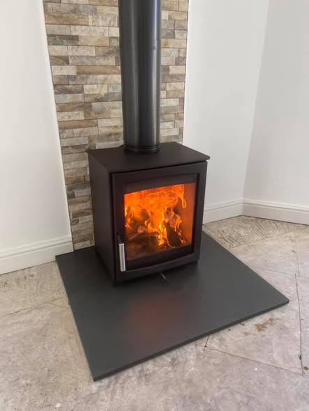 Herald Allure 07 Stove with Repointed Brick Chimney and Heat Shield