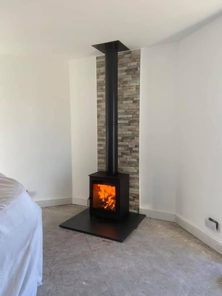 Herald Allure 07 Stove with Repointed Brick Chimney and Heat Shield