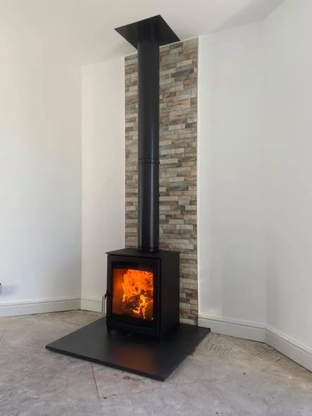 Herald Allure 07 Stove with Repointed Brick Chimney and Heat Shield