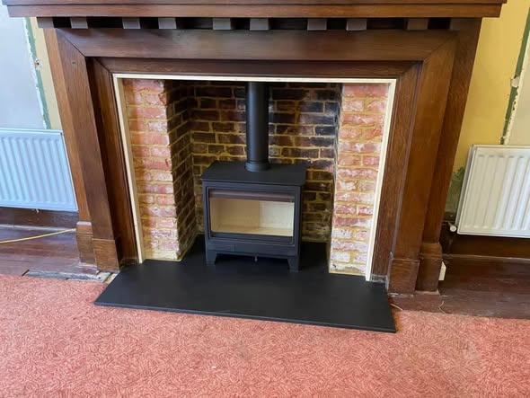 Herald Allure 07 Stove with Repointed Brick Chimney and Heat Shield