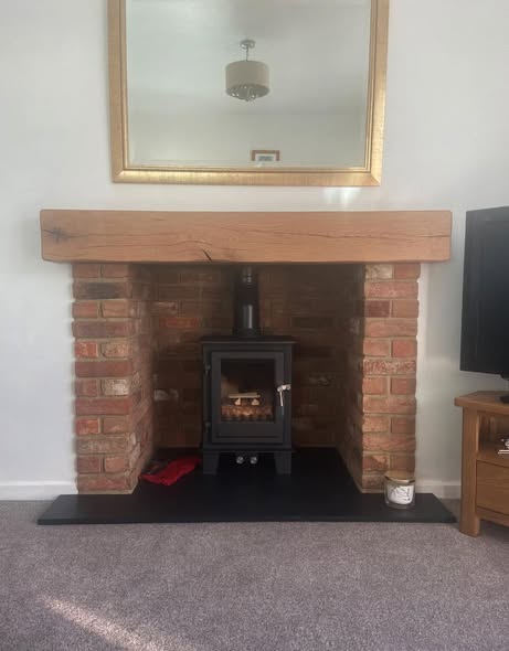 Herald Allure 07 Stove with Repointed Brick Chimney and Heat Shield