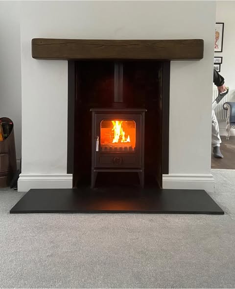Opened Chimney Breast with Original Brickwork and Stove