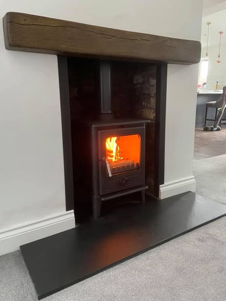 Opened Chimney Breast with Original Brickwork and Stove