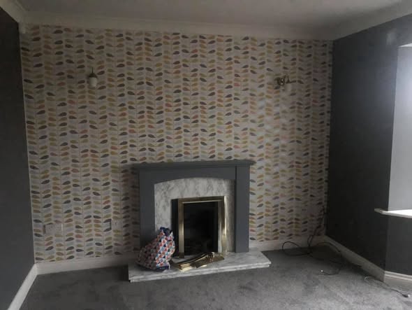 Opened Chimney Breast with Original Brickwork and Stove