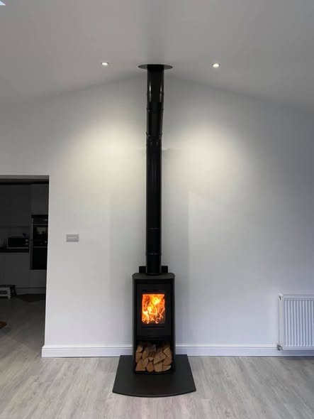 Feature Chimney Breast with Inset TV and Log Stores
