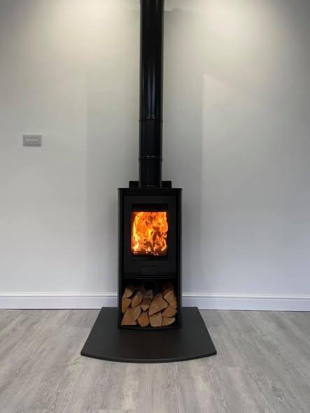 Feature Chimney Breast with Inset TV and Log Stores