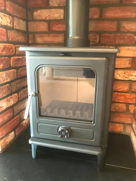 1970s Fireplace Transformed into Cottage Inglenook