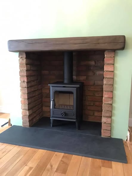 Jetmaster Inset Stove with Brick Slip Feature Wall