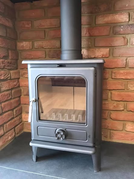 Jetmaster Inset Stove with Brick Slip Feature Wall