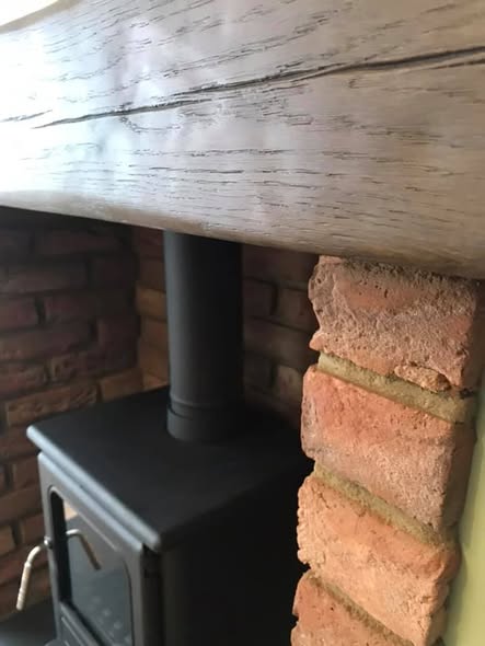 Jetmaster Inset Stove with Brick Slip Feature Wall
