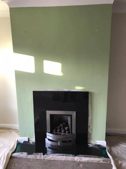 Jetmaster Inset Stove with Brick Slip Feature Wall