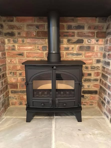 Jetmaster Inset Stove with Brick Slip Feature Wall