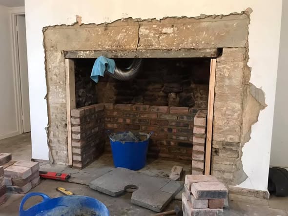 Jetmaster Inset Stove with Brick Slip Feature Wall