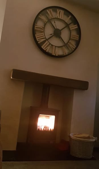 Prudhoe Multifuel Stove Replacing Hole-in-Wall Gas Fire